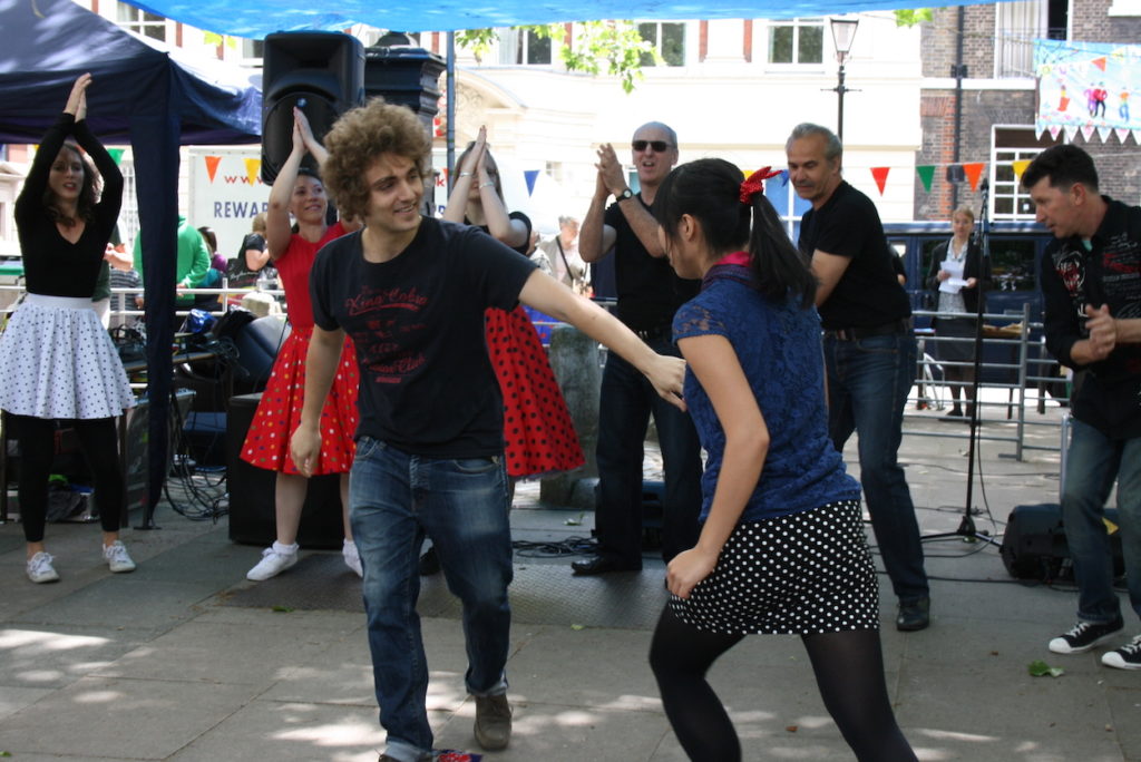 Student practicing Rock 'n' Roll in a square near Holborn